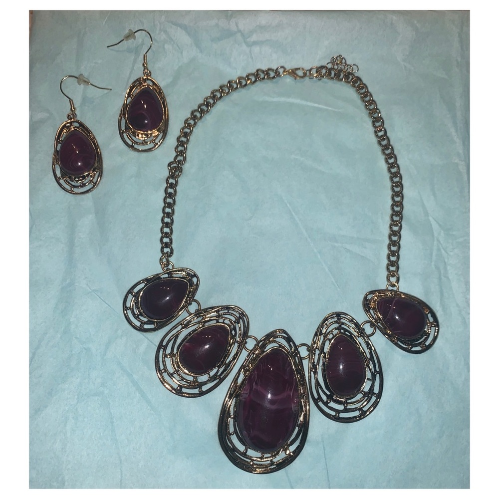 Gold and purple necklace and earrings
